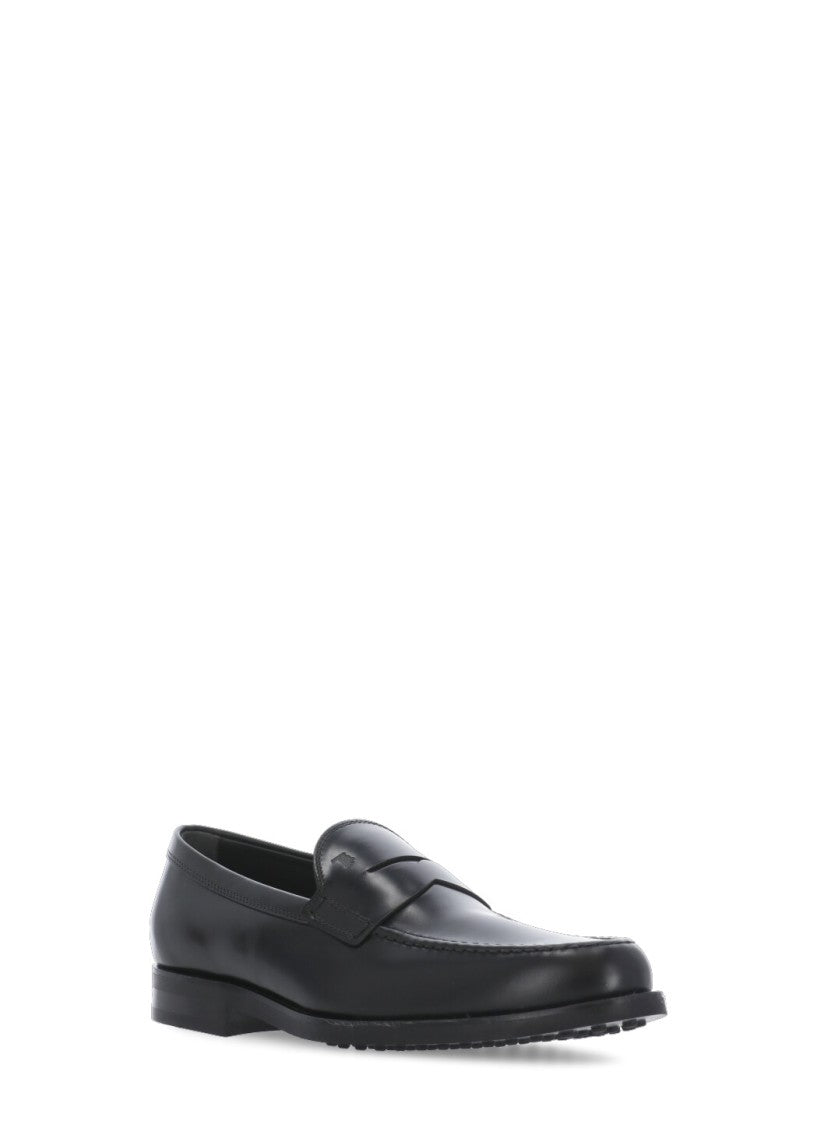 Tod's Black Embossed Monogram Loafers