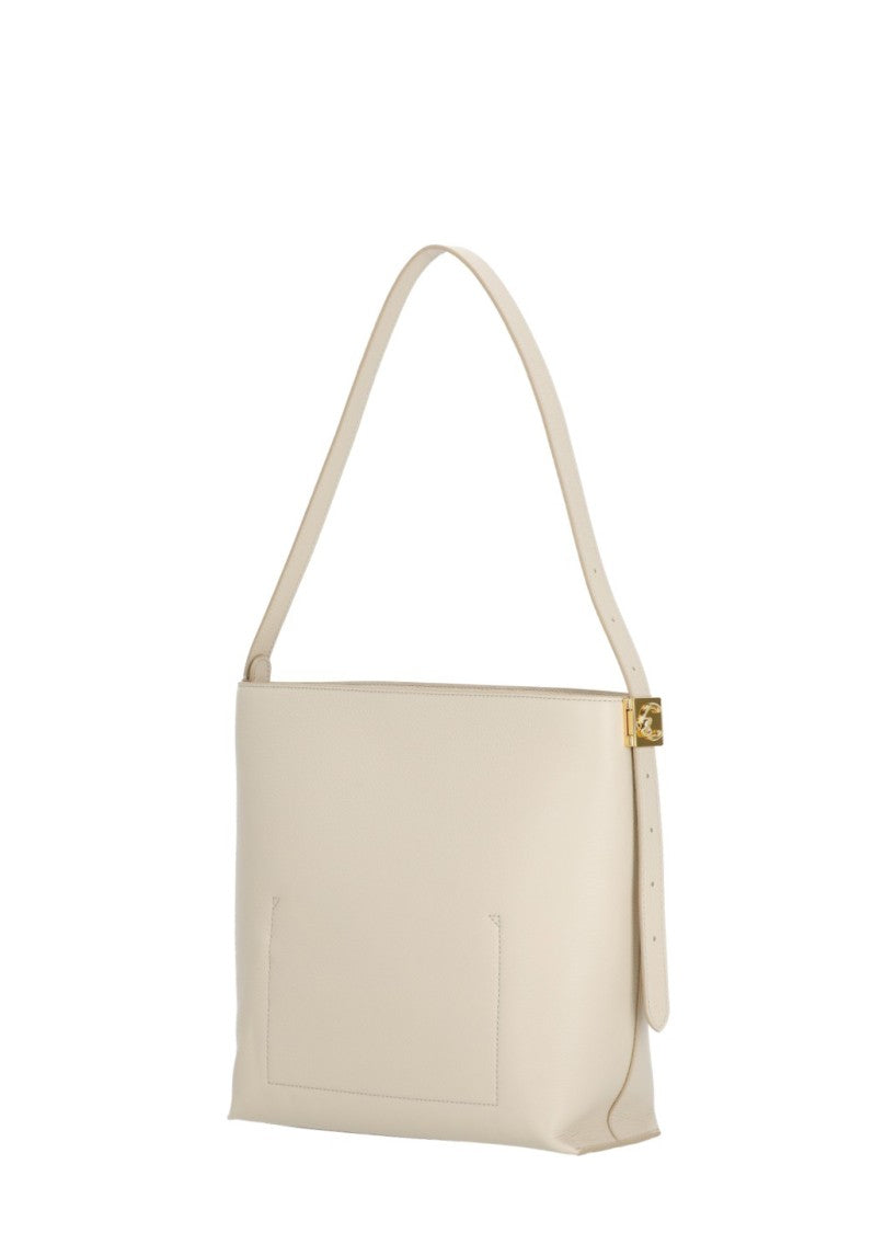 Coccinelle C-Me Lock Bag With Structured Silhouette And Golden Accents