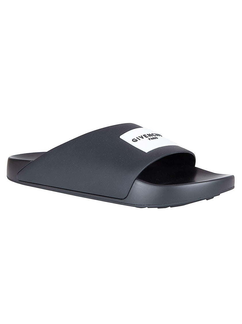 Givenchy Asymmetrical Black Rubber Slides With Embossed Logo