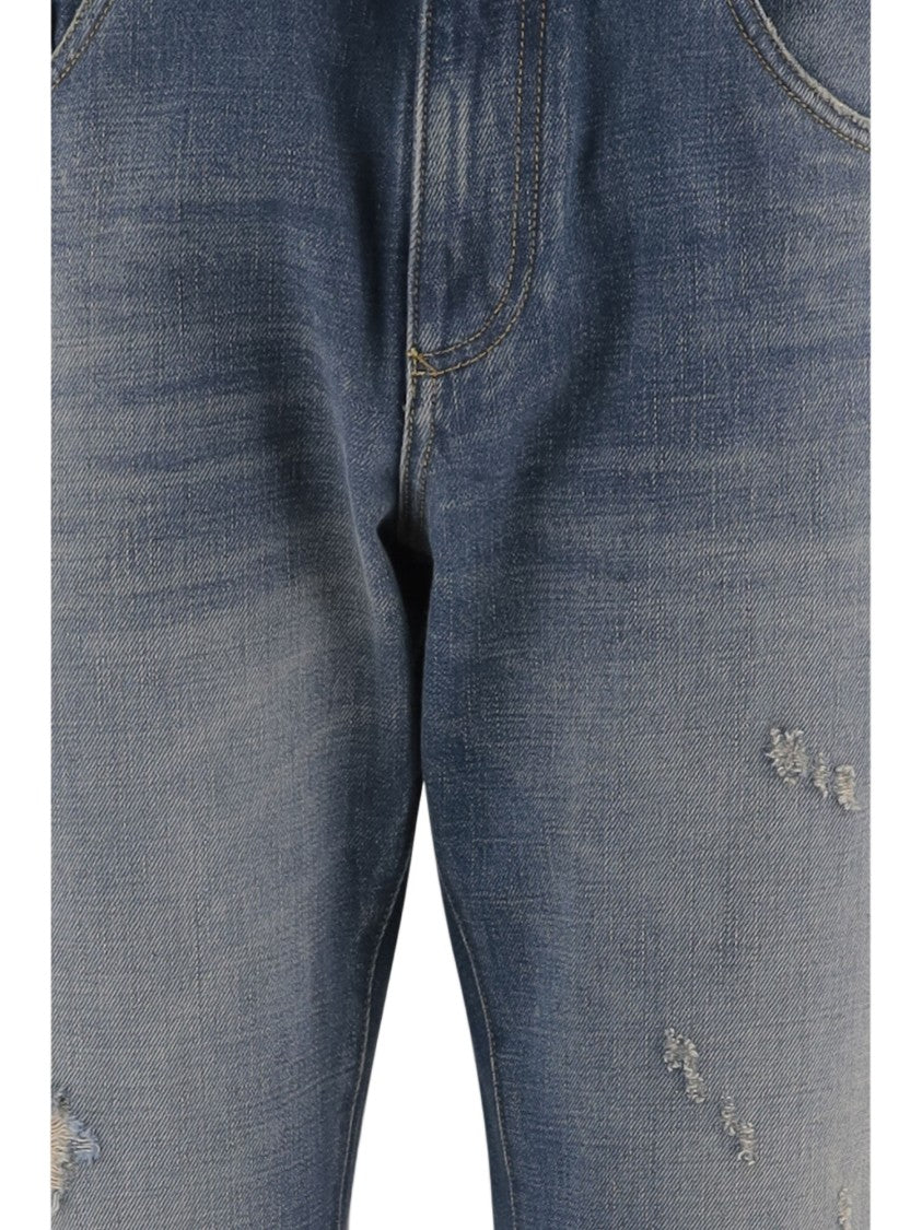 Dolce & Gabbana Washed Blue Cotton Denim Jeans With Distressed Details