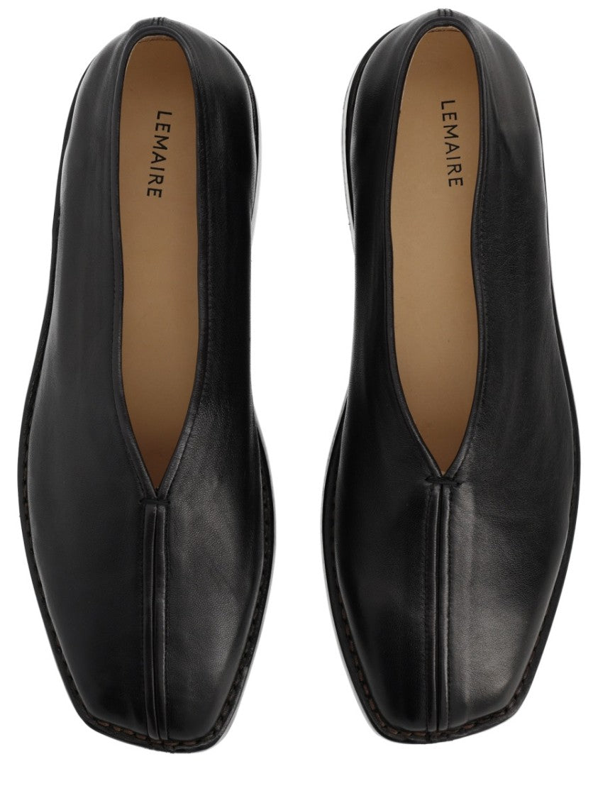 Lemaire Black Lamb Leather Slippers With Central Seam And Piping Detail