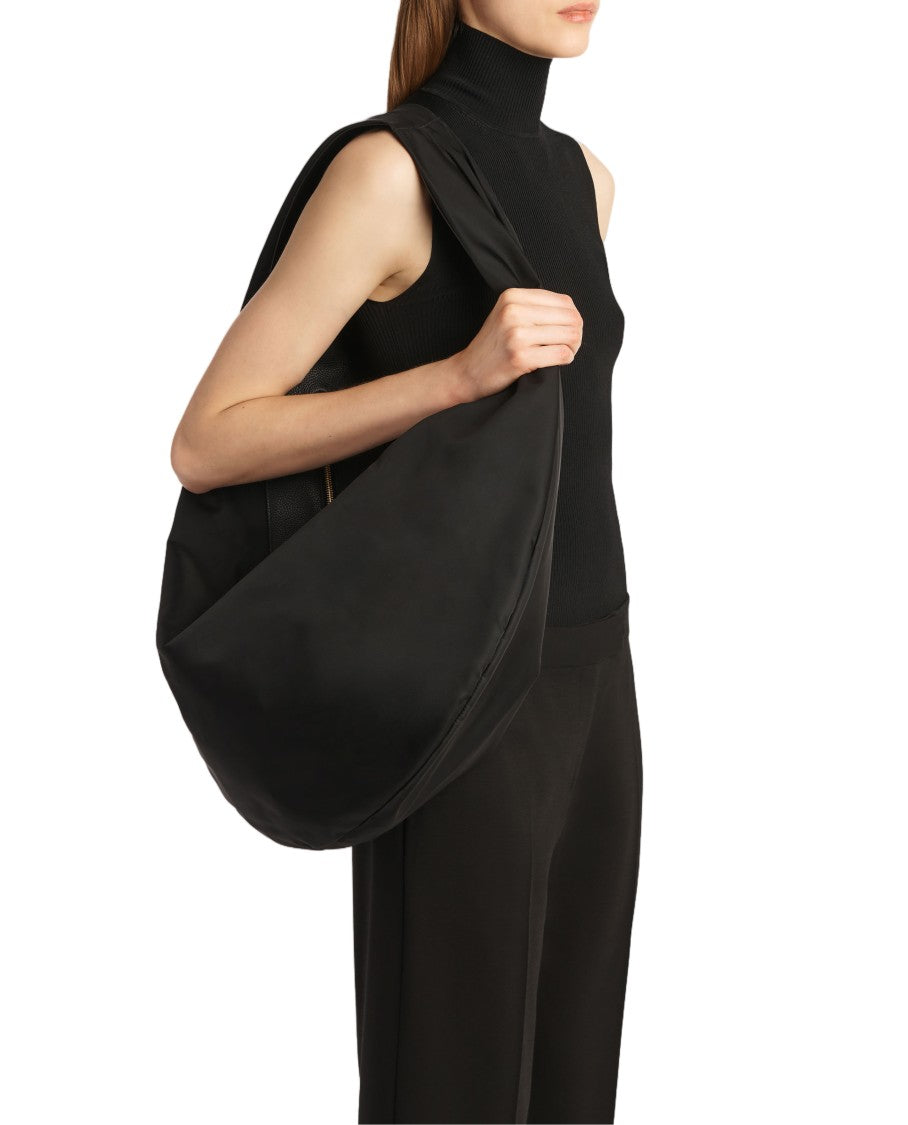 Khaite Crescent-Shaped Hobo Bag With Zip Closure And Gold Accents