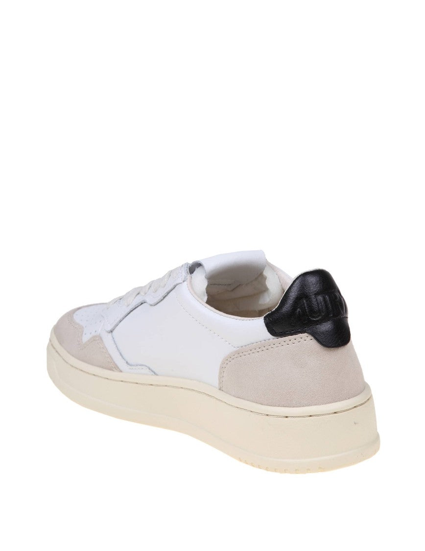 Autry Sneakers In Black And White Leather And Suede
