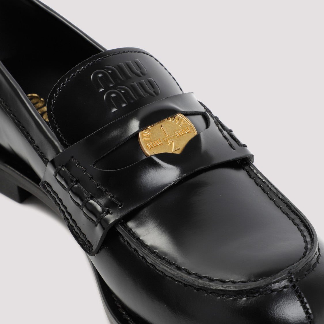 Miu Miu Black Leather Slip-On Loafers