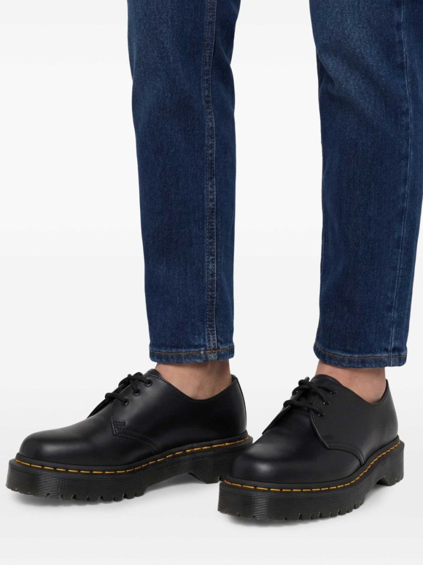 Dr. Martens Polished Black Leather Flats With Chunky Ridged Sole