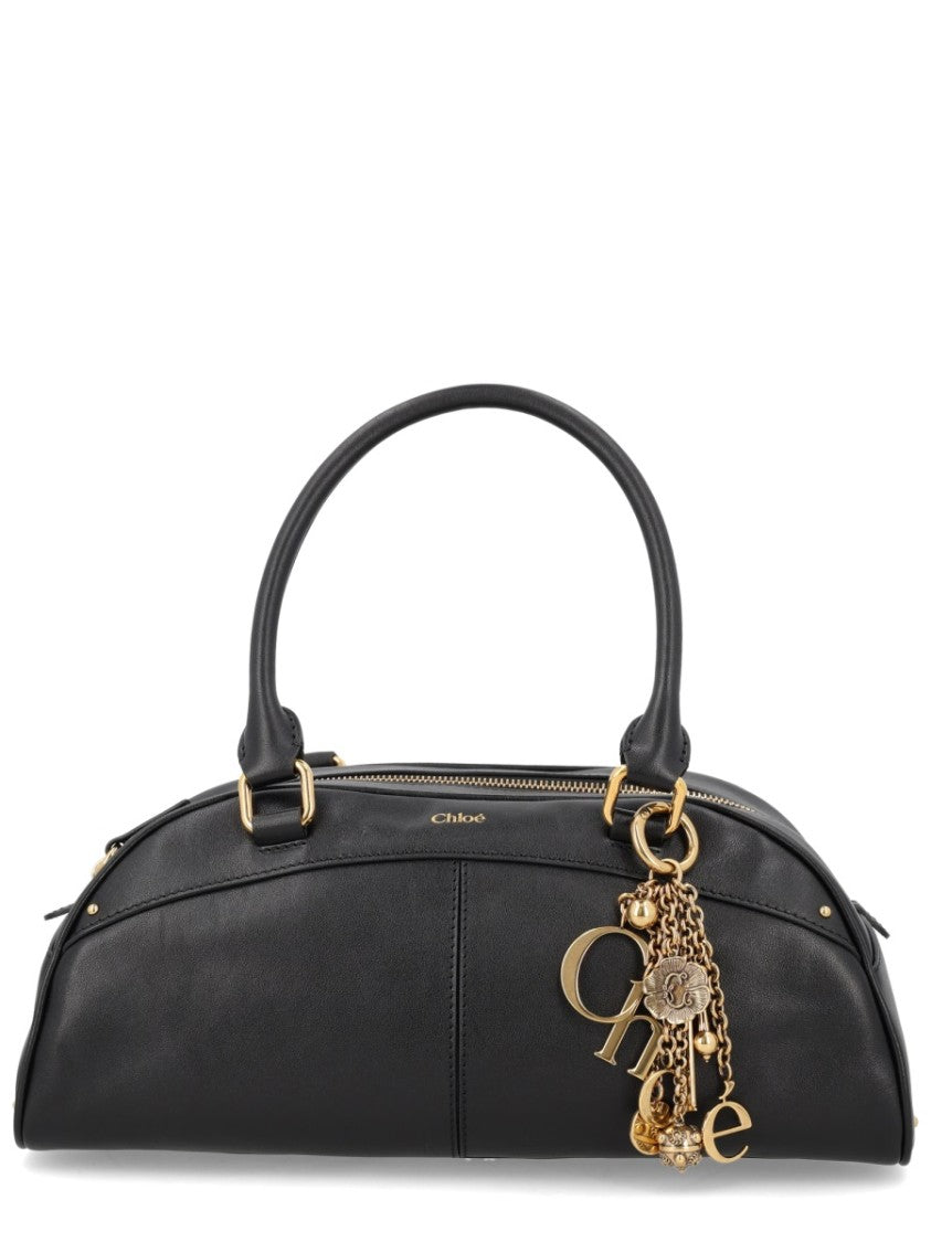 Chloé Sleek Elongated Black Leather Bowling Bag With Gold Hardware