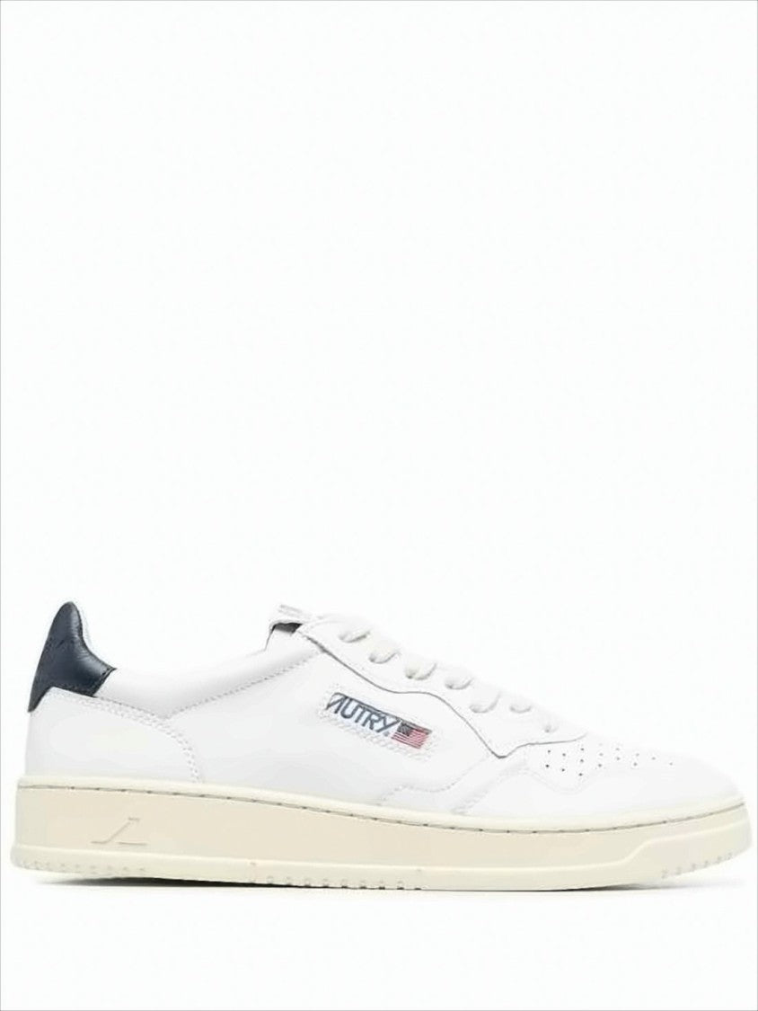 Autry Minimalist Low-Top Sneakers With Perforated Detailing