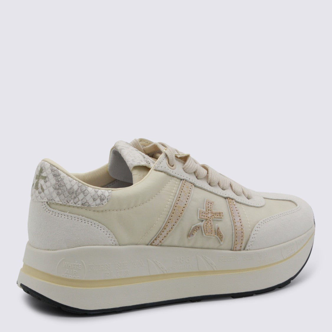 Premiata Off-White Sneakers With Textured Accents And Metallic Charm