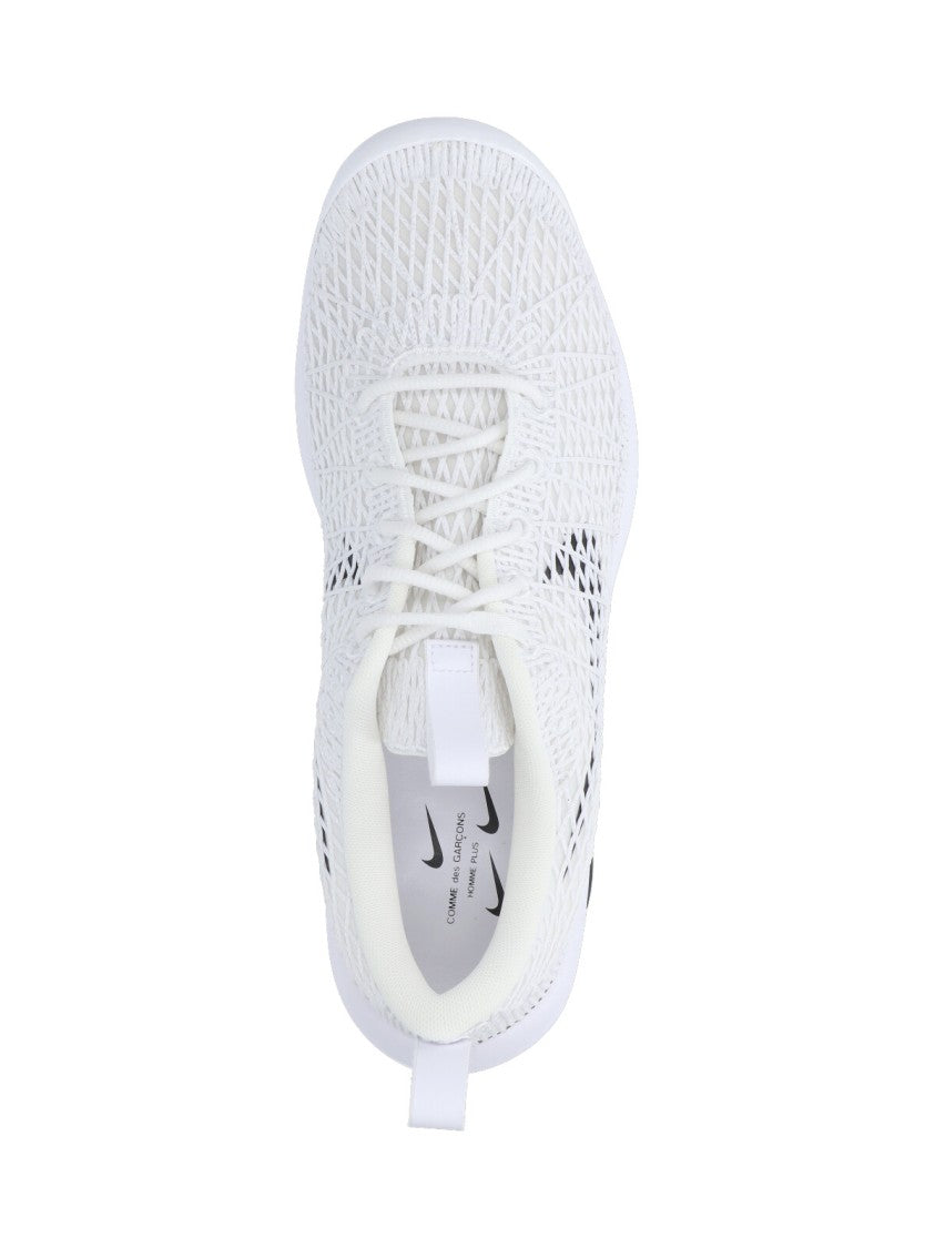 Comme Des Garçons Low-Profile White Sneakers With Subtle Textured Upper