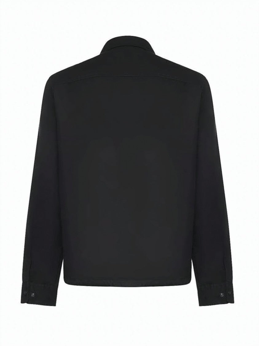 C.P. Company Minimalist Black Jacket With Classic Collar And Logo Patch