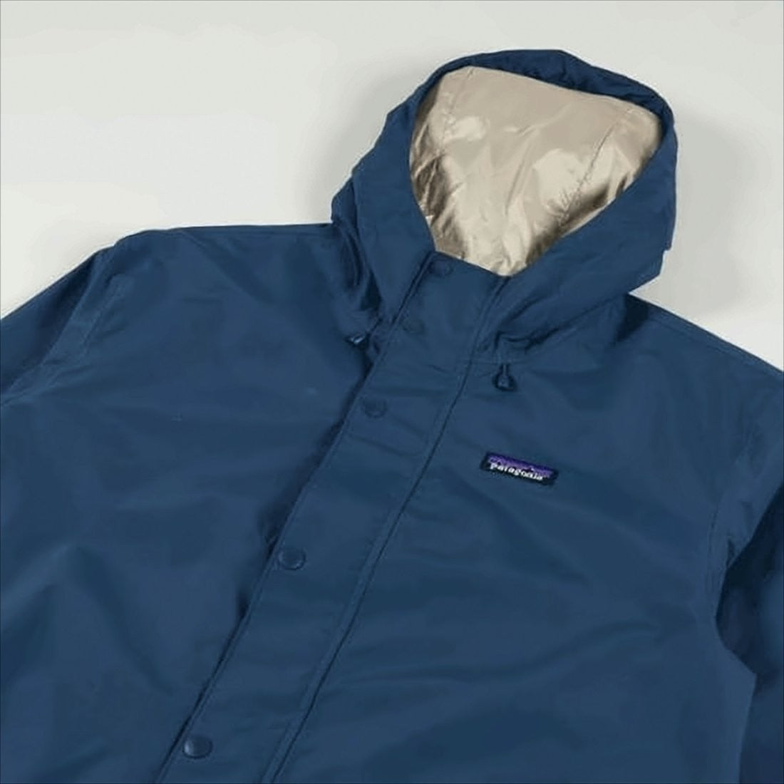 Patagonia Deep Blue Casual Jacket With Adjustable Hood And Functional Design