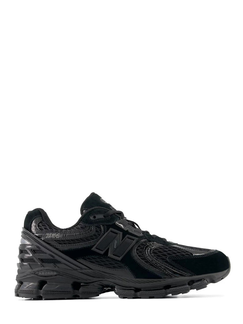 New Balance Textured All-Black Sneakers With Cushioned Sole And Iconic Branding