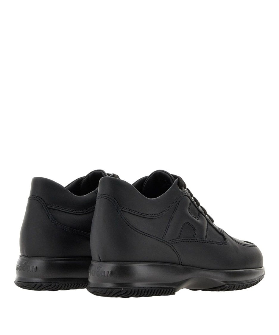 Hogan Contemporary Black Calfskin Sneakers With Elegant Design