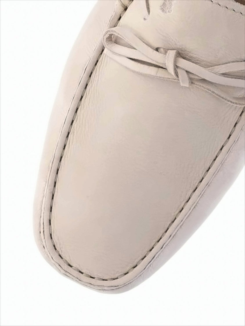 Tod's Moccasin Toe Loafers With Lace Detail And Rubber Sole