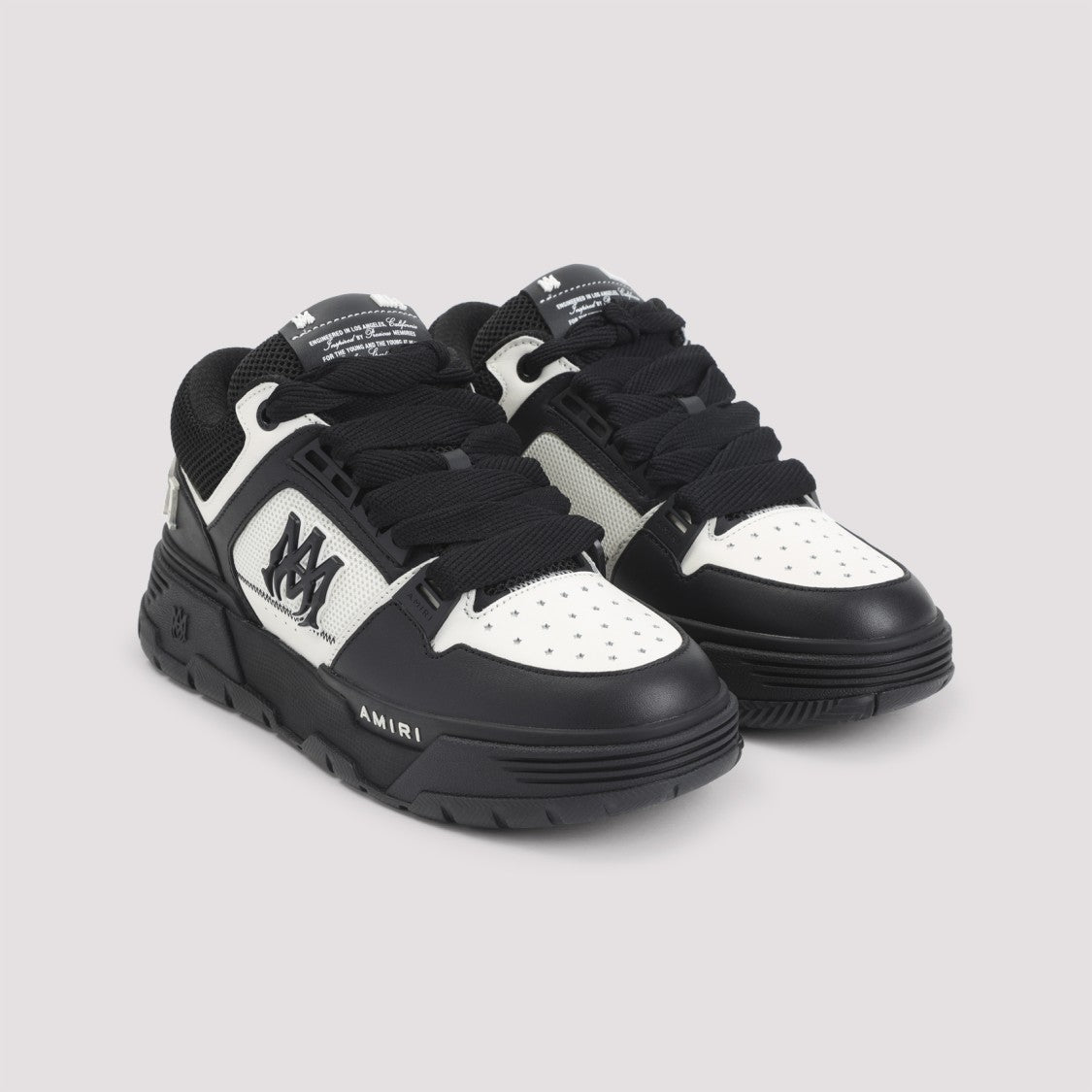 Amiri Premium Leather Sneakers With Bold Detailing And Breathable Mesh Panels