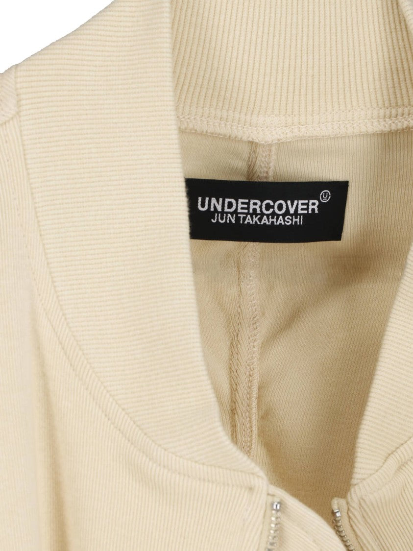 Undercover Asymmetrical Hem Jacket With Utilitarian Pockets