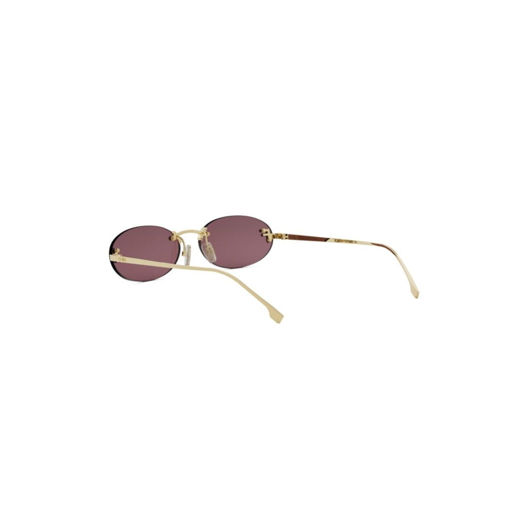 Fendi Oval Lens Sunglasses With Gold-Toned Frame And Tinted Lenses