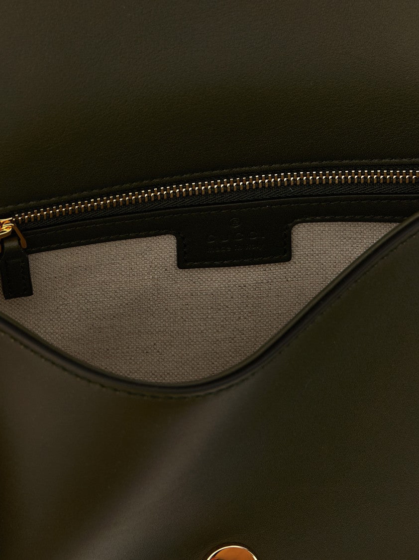 Gucci Smooth Leather Medium Handbag With Embossed Gg Logo