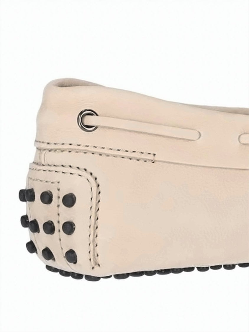 Tod's Moccasin Toe Loafers With Lace Detail And Rubber Sole