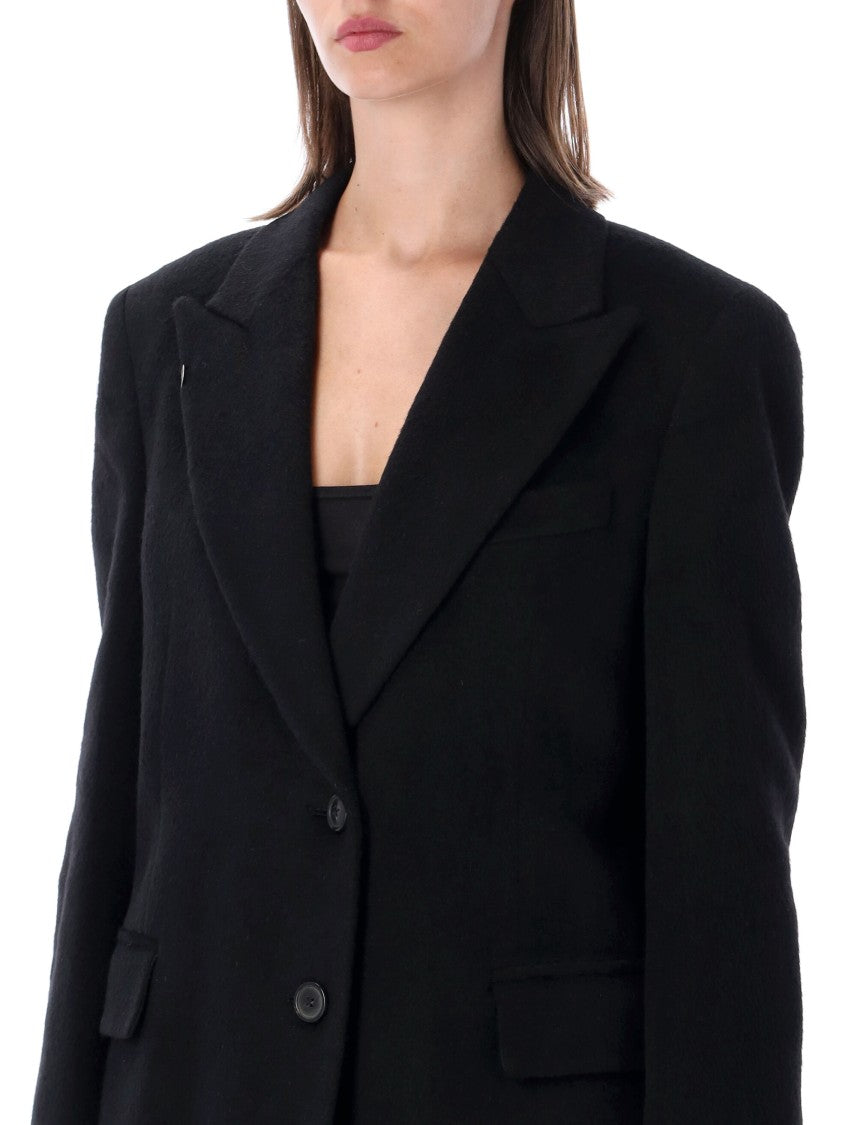 Our Legacy Tailored Long Black Coat With Notched Lapel And Flap Pockets