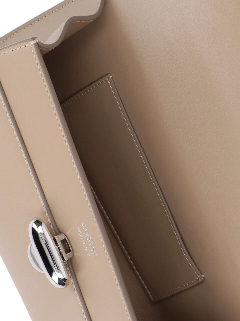 Savette Rectangular Beige Handbag With Silver Clasp Closure