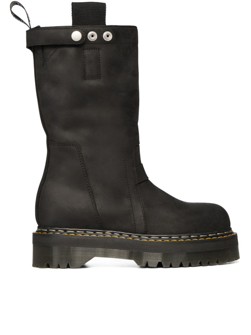 Dr. Martens Mid-Calf Pull-On Boots With Chunky Ridged Sole And Rugged Detailing