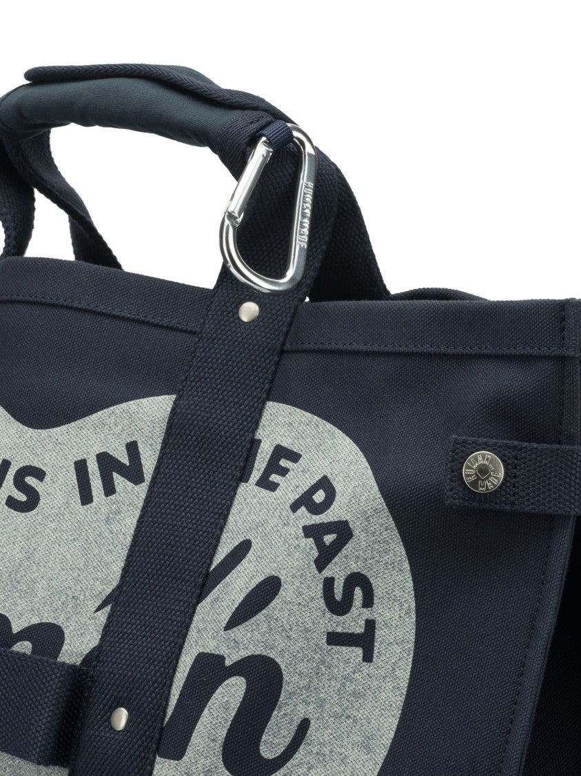Human Made Durable Canvas Travel Bag With Heart Motif And Integrated Pocket