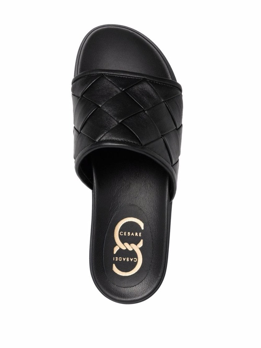 Casadei Minimalist Black Leather Mules With Woven Strap