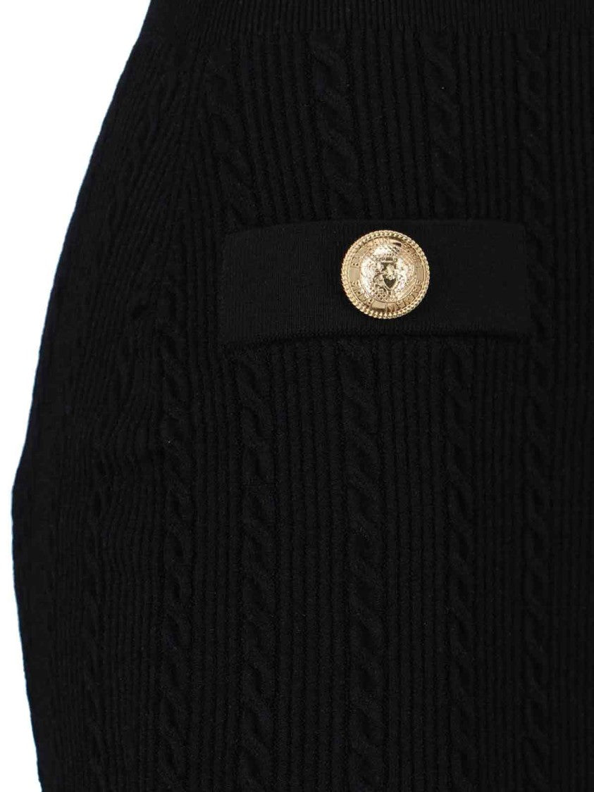 Balmain Fitted Black Dress With Ribbed Texture And Gold Accents