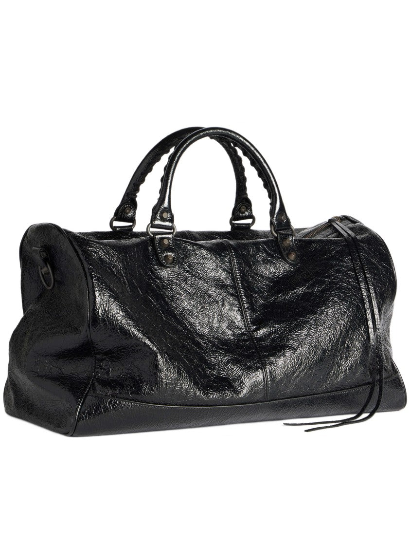 Balenciaga Glossy Black Leather Duffle Bag With Studded Zip Pocket