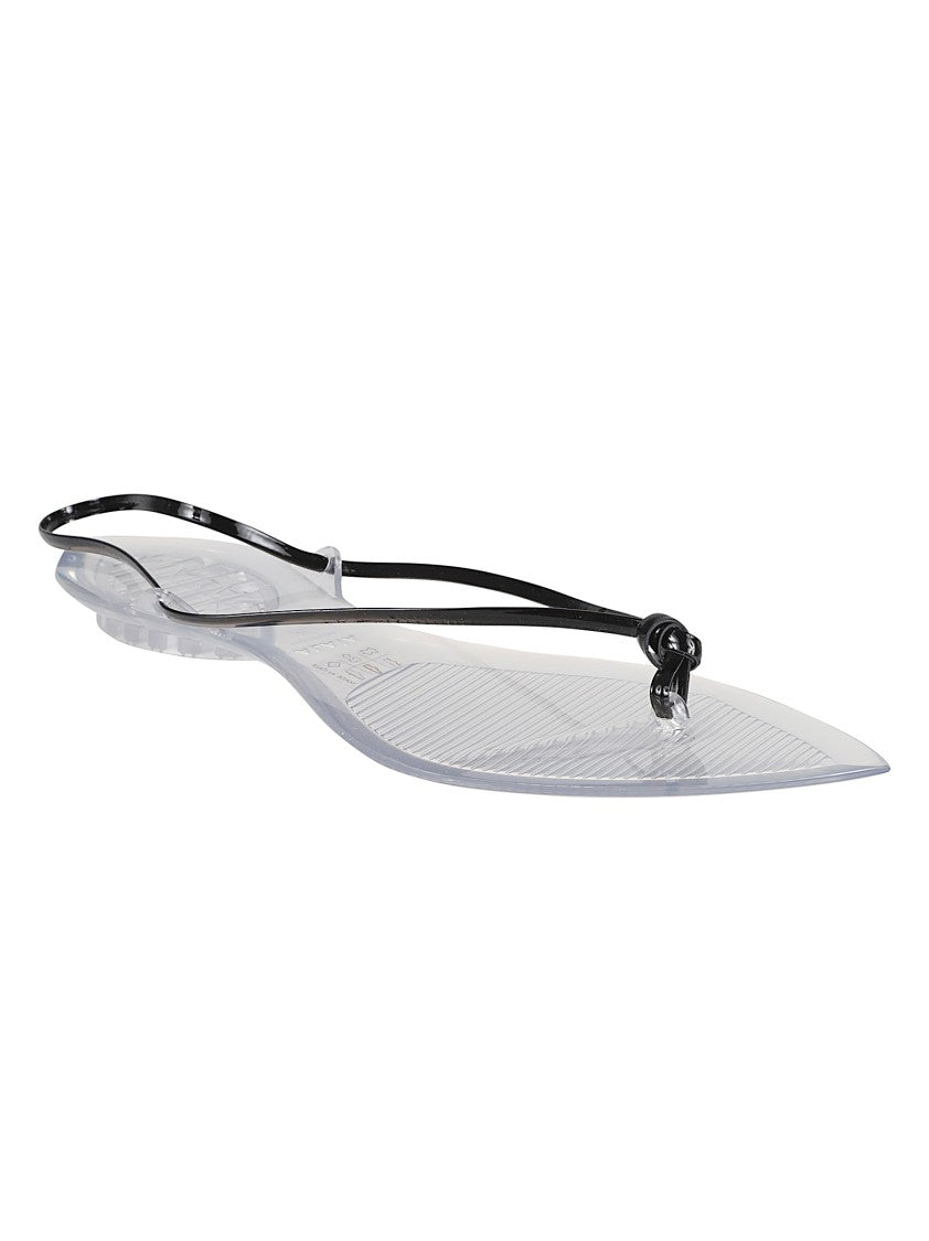 Alaïa Flat Thong Sandals With Glossy Finish And Pointed Details