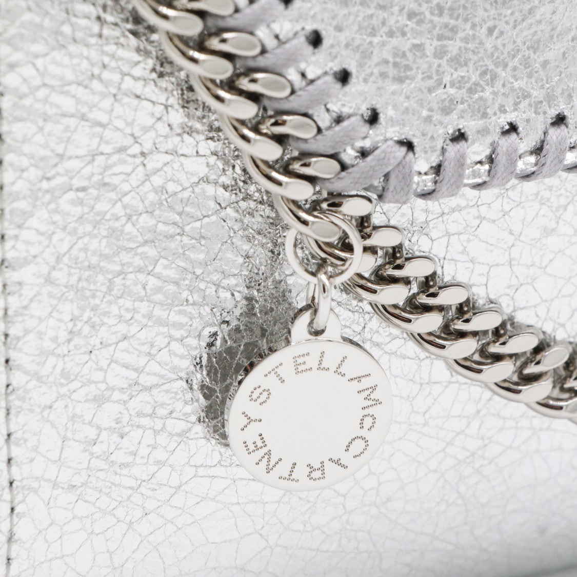 Stella Mccartney Rectangular Metallic Silver Cracked Texture Bag With Silver Chain Accents