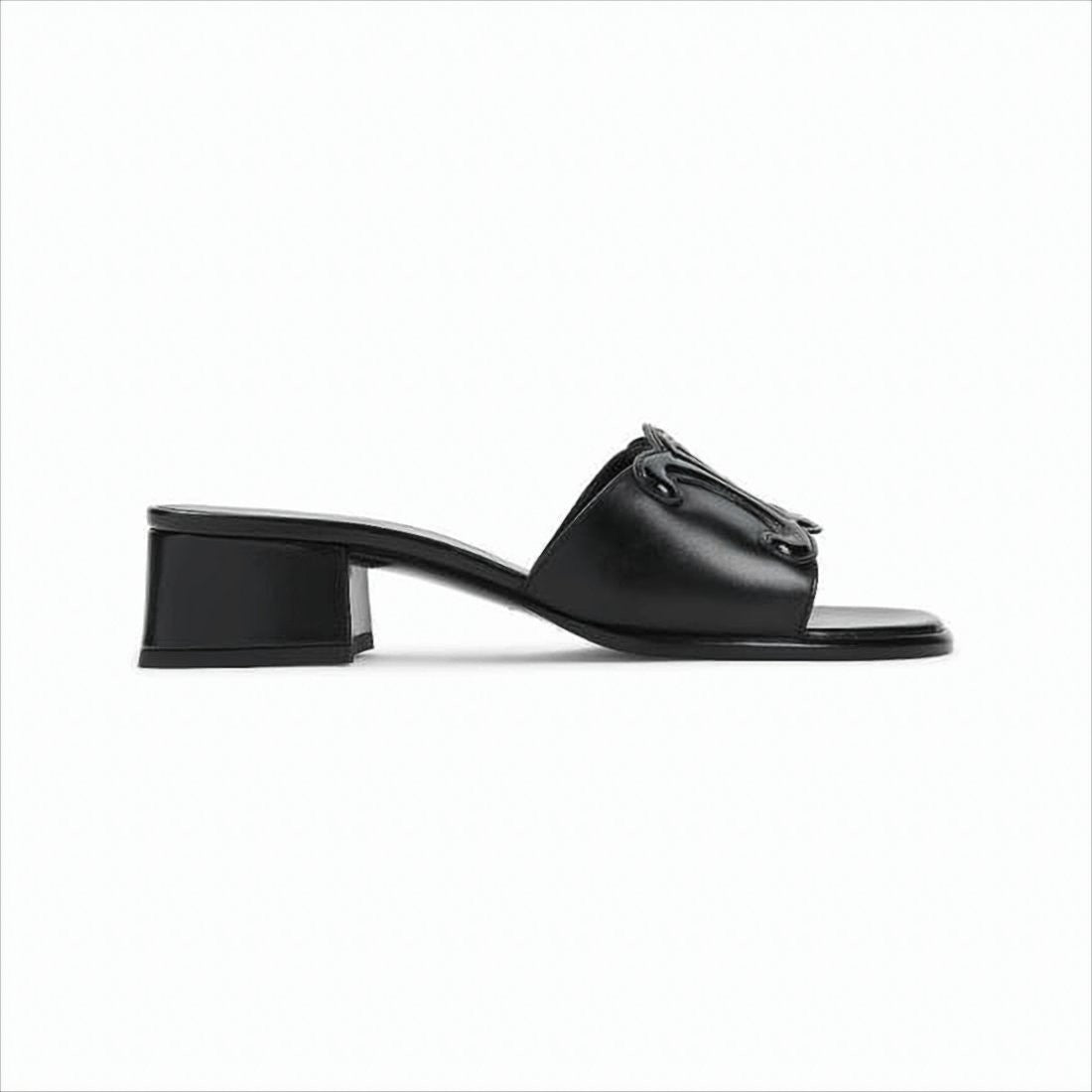Celine Open Toe Mules With Glossy Emblem Detail