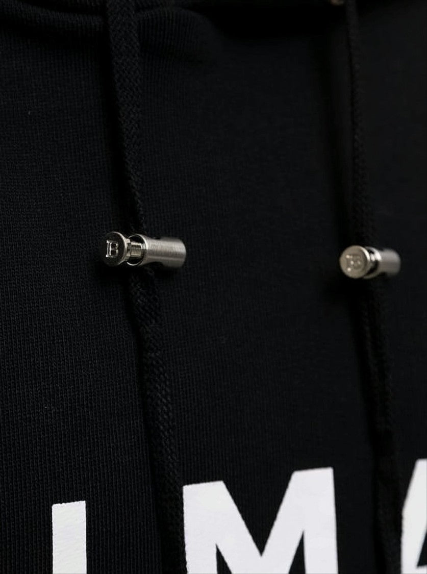 Balmain Contemporary Black Hoodie With Bold Lettering