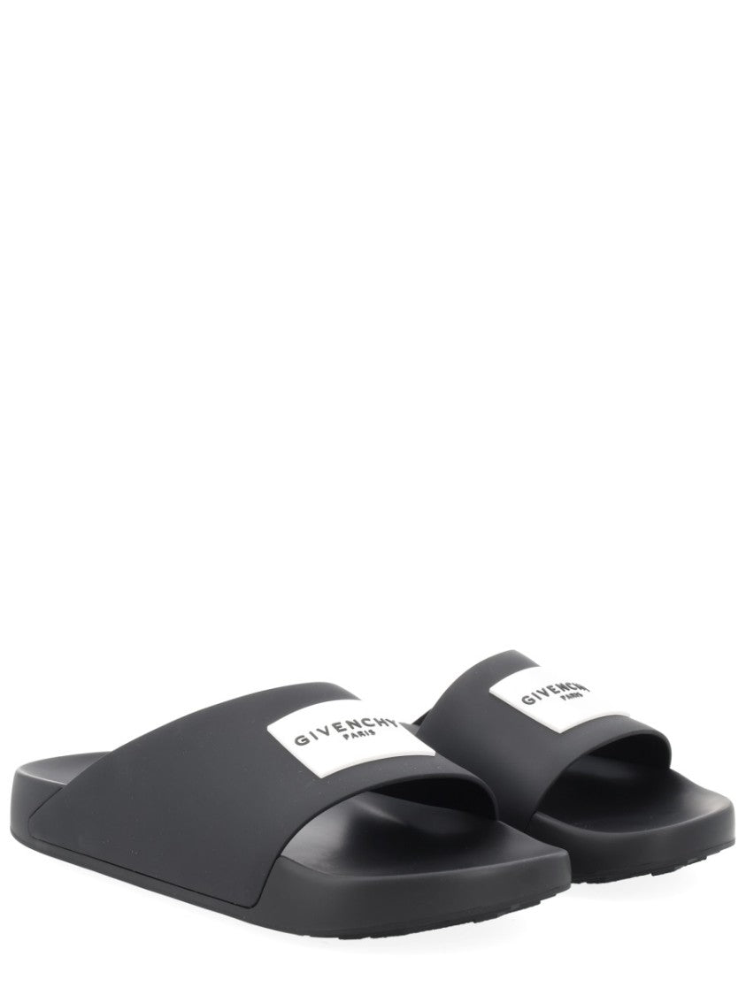 Givenchy Minimalist Black Slide Sandals With Contrasting Label