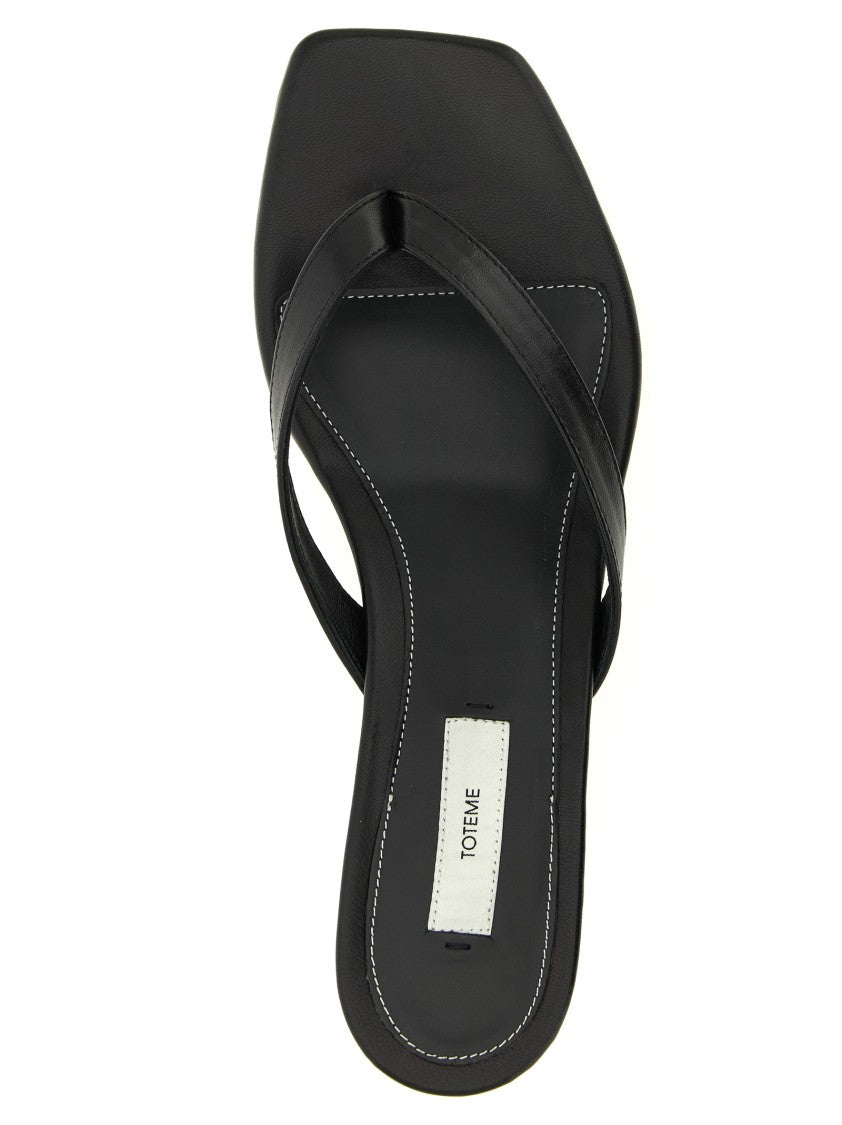 Totême Minimalist Black Leather Thong Sandals With Square Toe And Low Heel