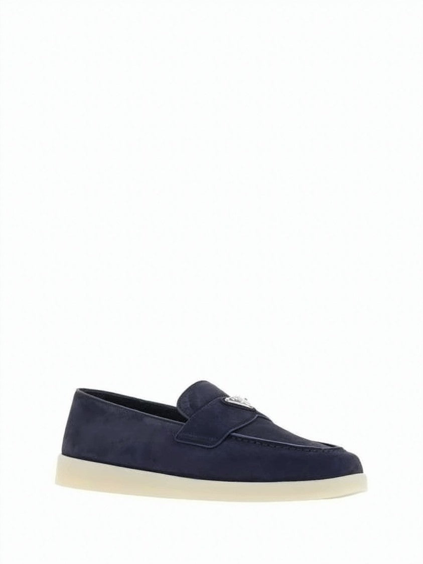 Prada Soft Suede Loafers With Contrasting Sole And Emblem Detail