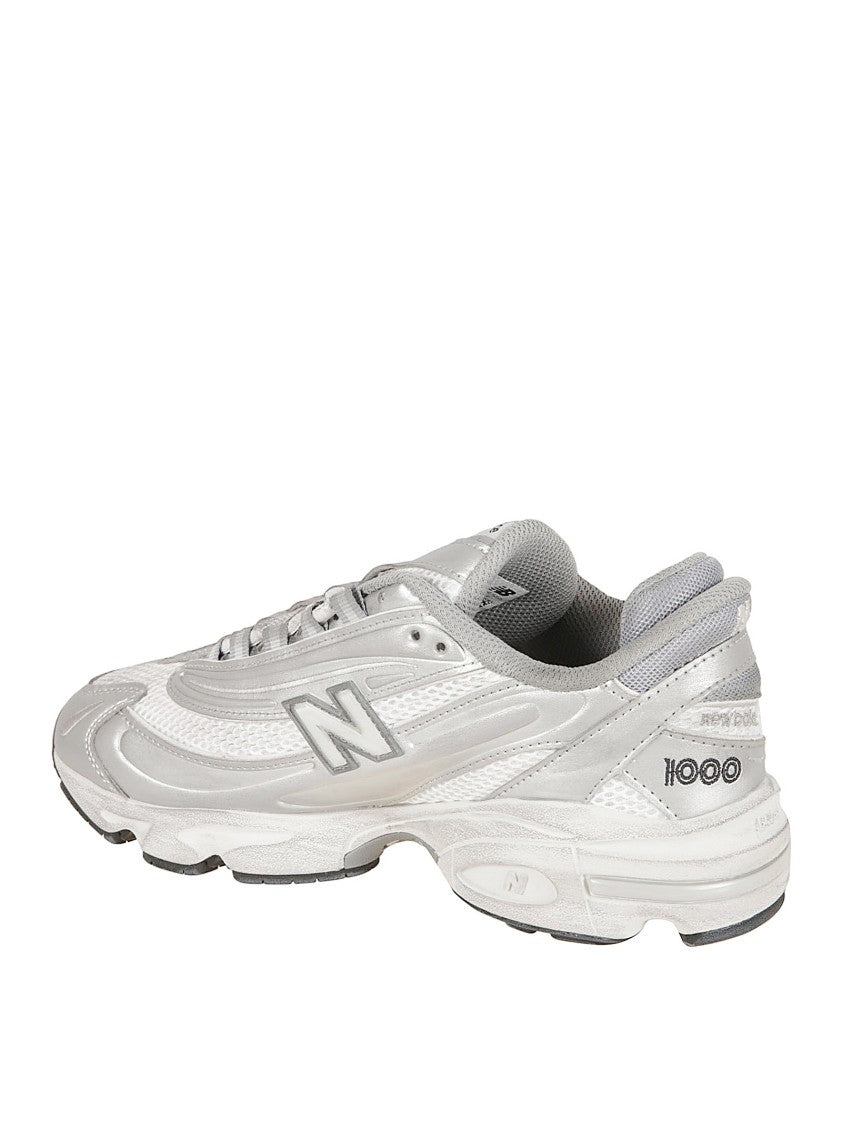 New Balance Streamlined Silver Sneakers With Textured Sole