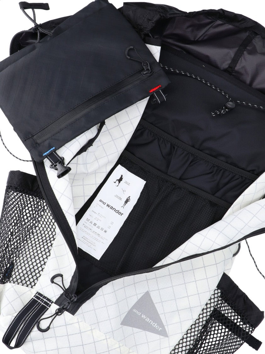 And Wander White Grey Technical Ecopack 30L Grid-Pattern Backpack