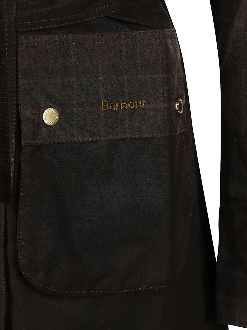Barbour Waxed Black Jacket With Plaid Accents And Metallic Hardware