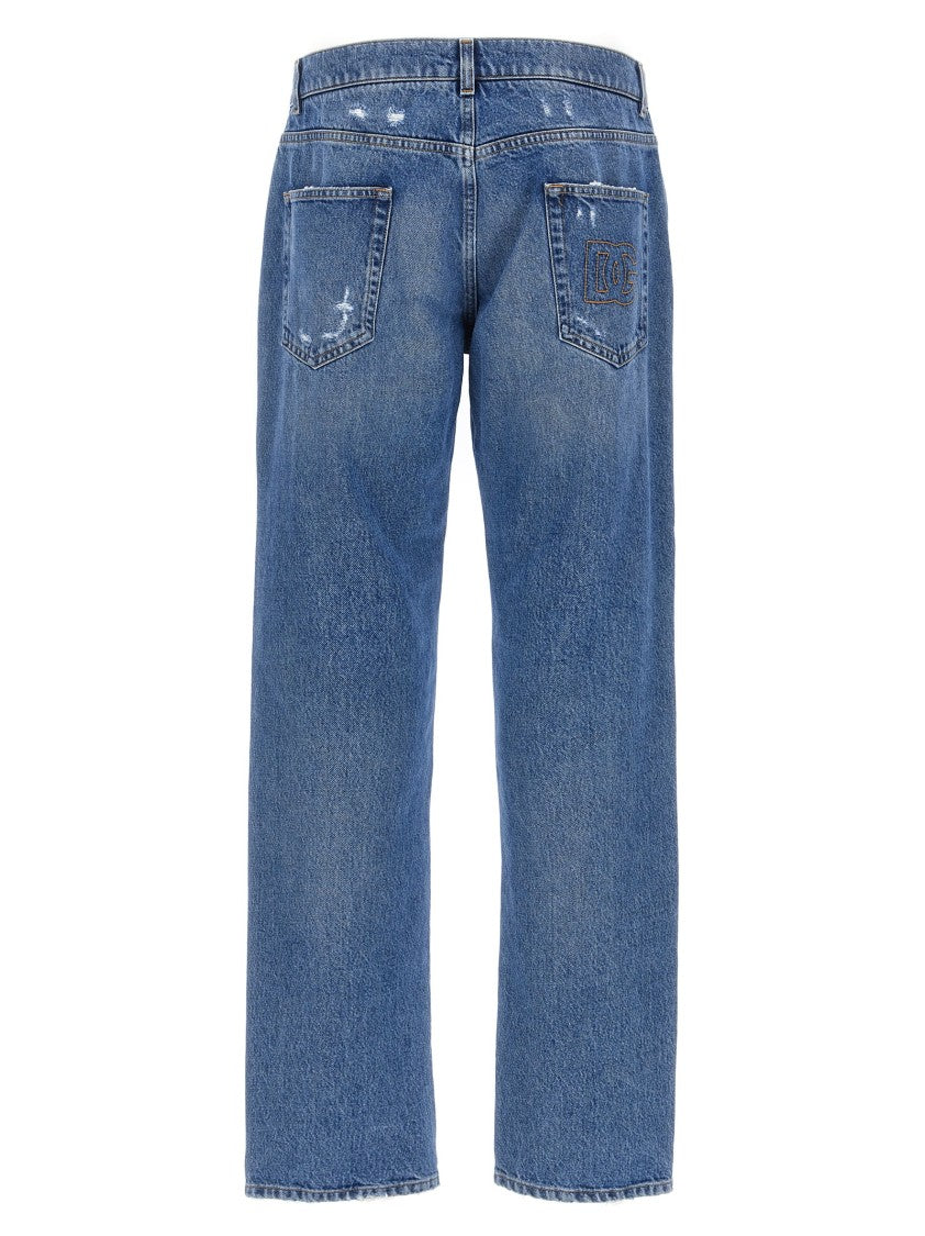 Dolce & Gabbana Distressed Blue Denim Jeans With Logo Embroidery