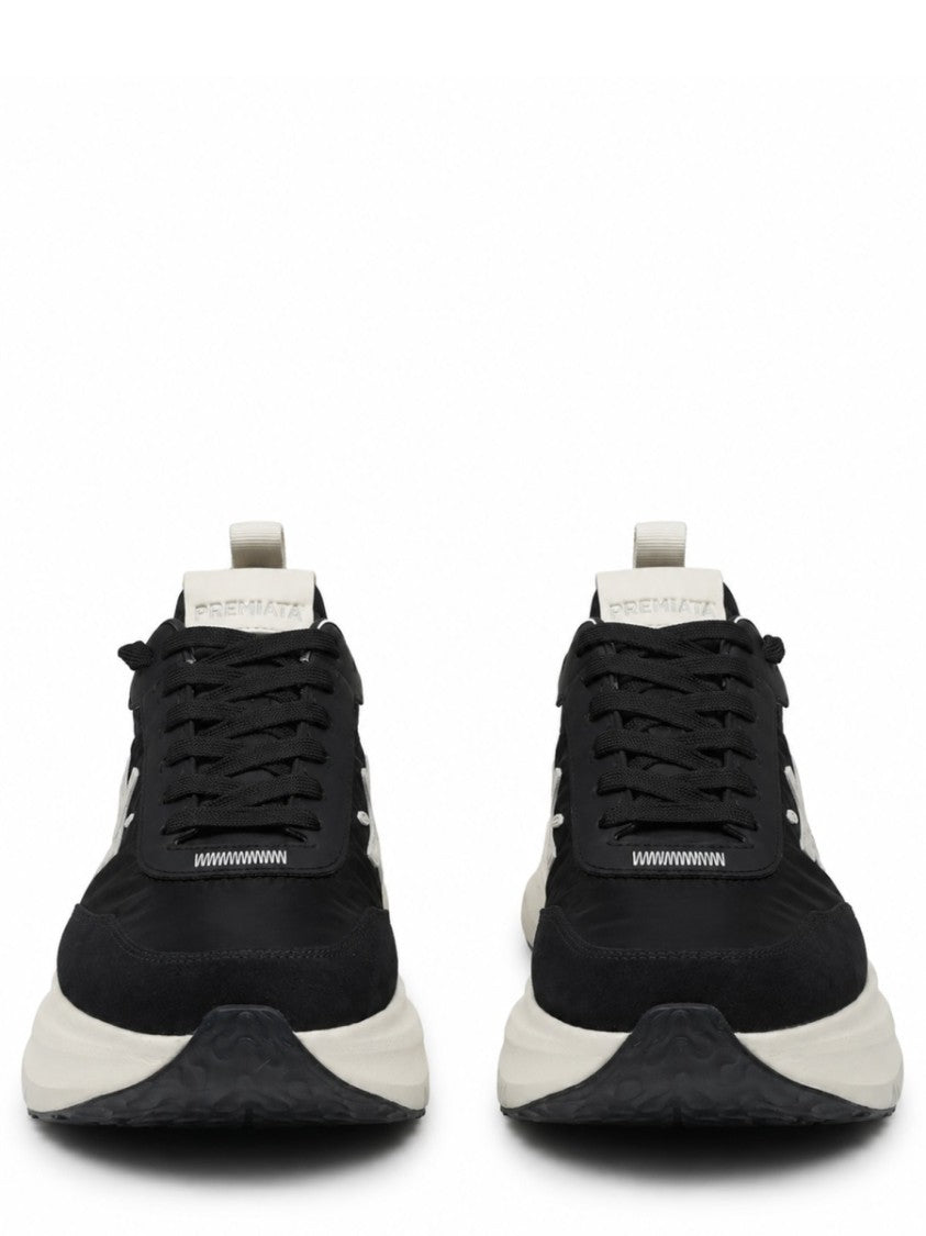 Premiata Cushioned Black Sneakers With Textured Outsole And Contrasting Logo