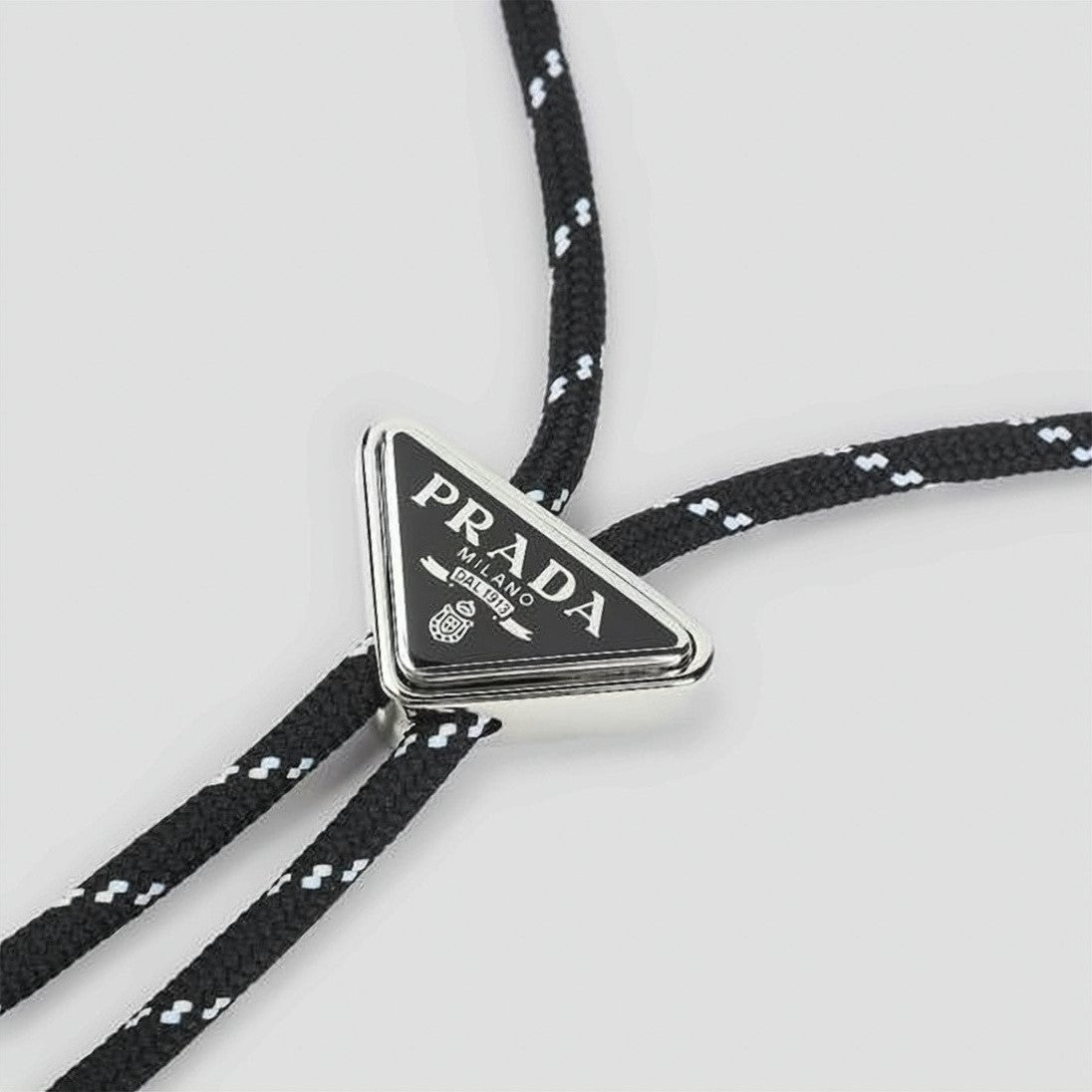 Prada Triangular Pendant Necklace With Black Cord