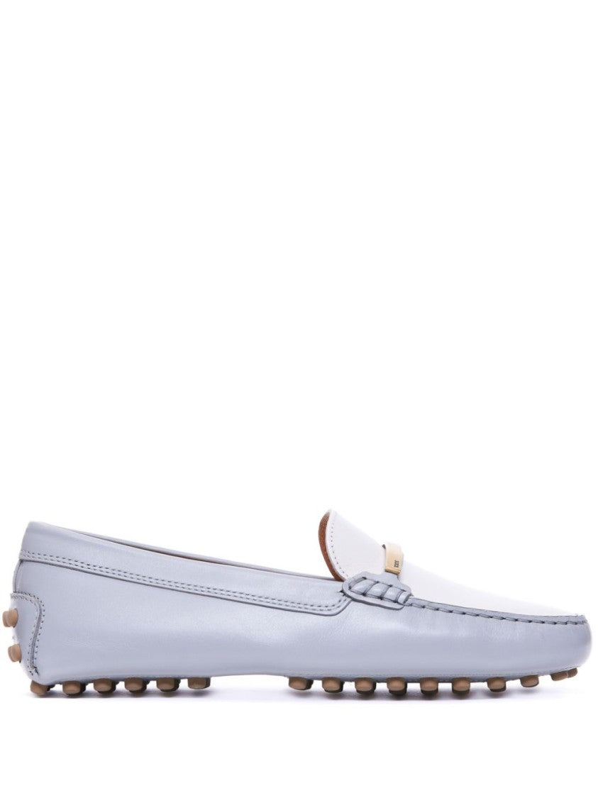 Tod's Classic White Moccasin Flat Shoes With Rubber Studded Sole