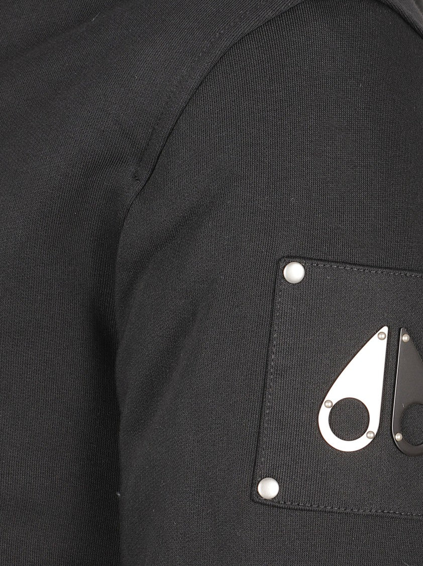 Moose Knuckles Black Zip-Up Hoodie With Plush Hood And Distinctive Patch Detail