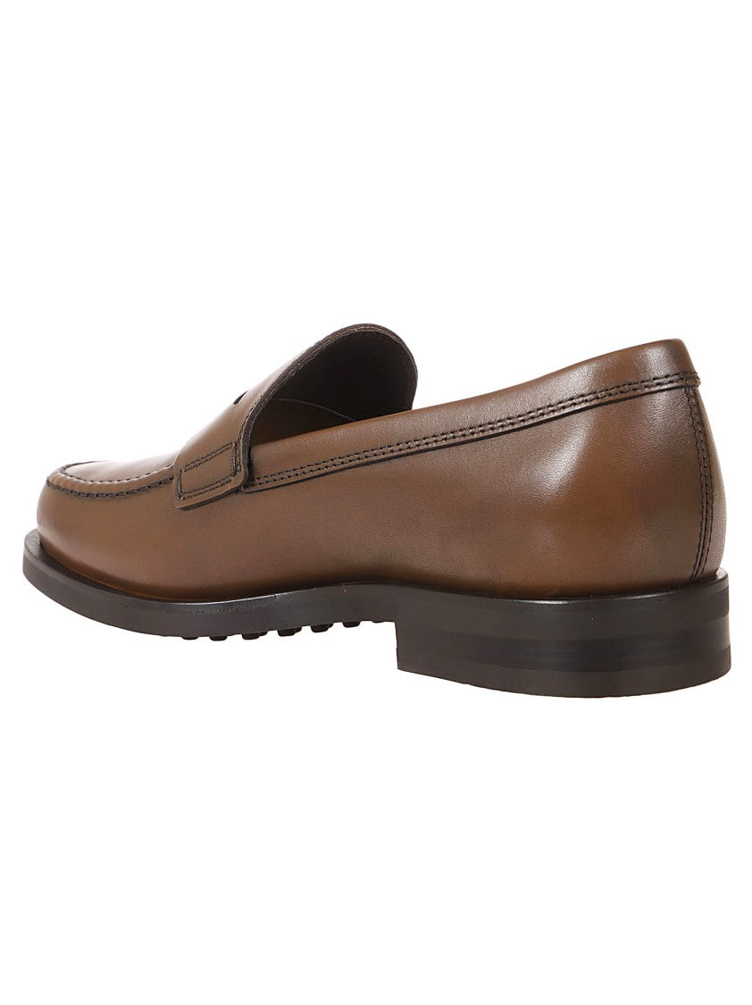 Tod's Penny Loafer Moccasin Shoes With Fine Stitching