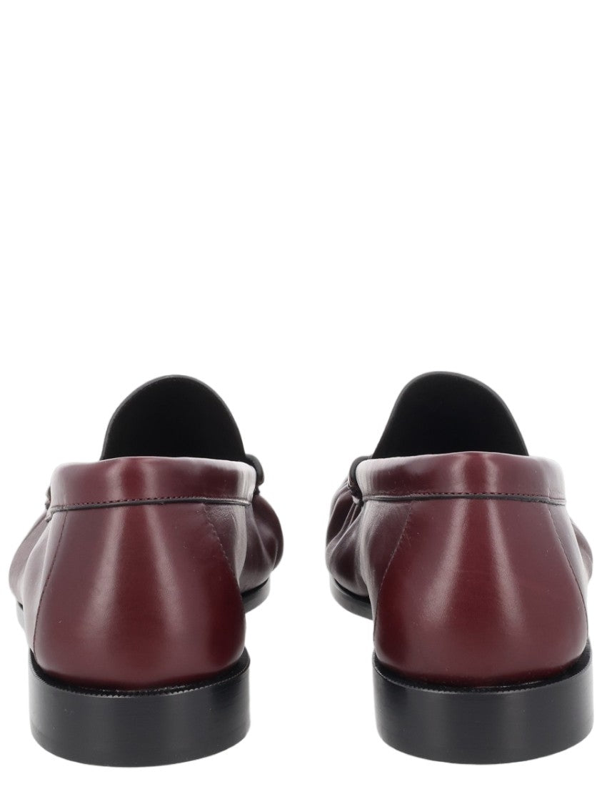 Saint Laurent Ruched Burgundy Calfskin Loafers With Metallic Emblem