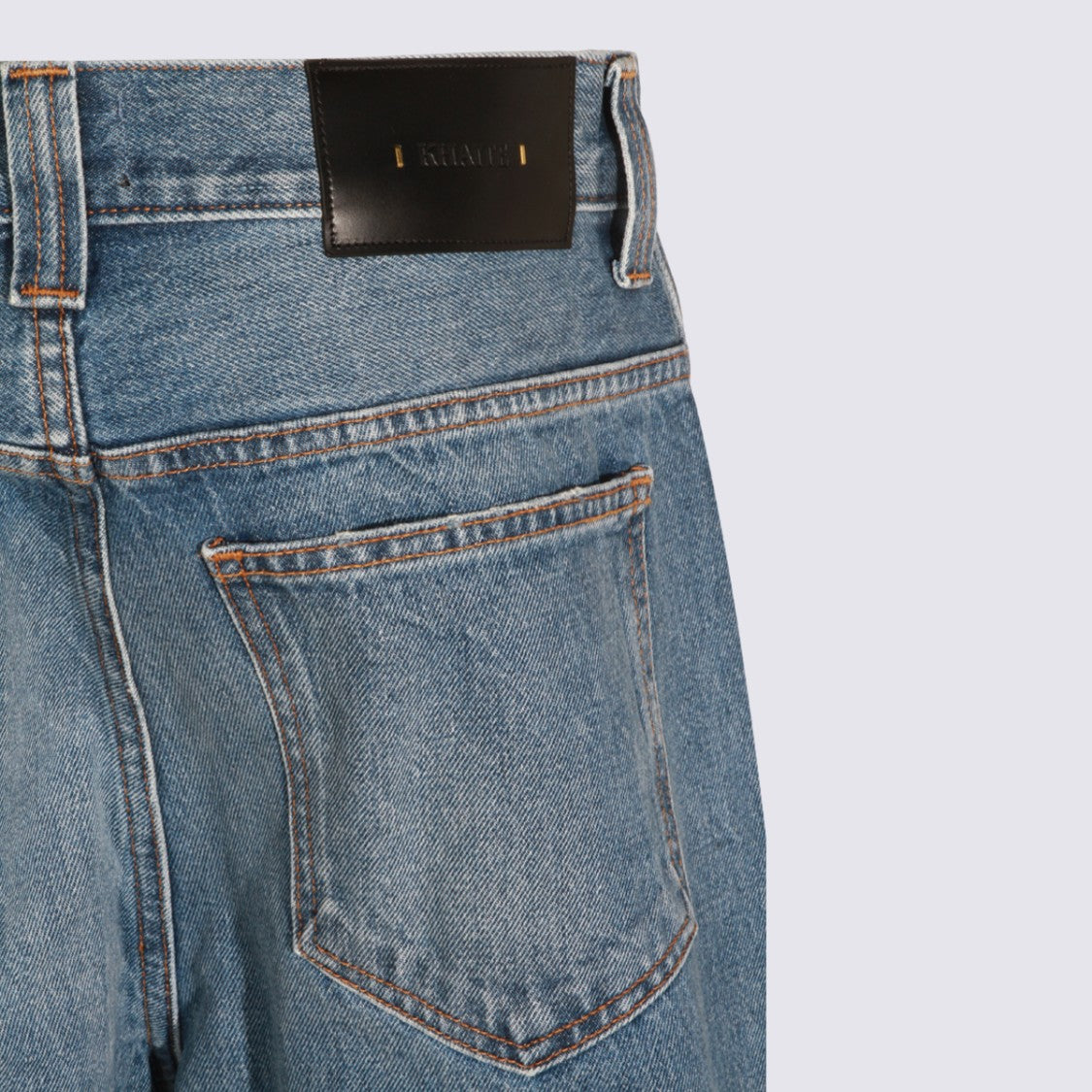 Khaite Mid-Blue Straight-Leg Jeans With Subtle Fading And Distressed Hems