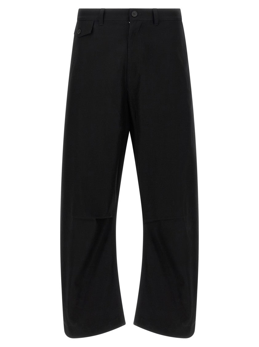 Comme Des Garçons Curved Leg Trousers With Knee Pincer Detail And Adjustable Back Strap