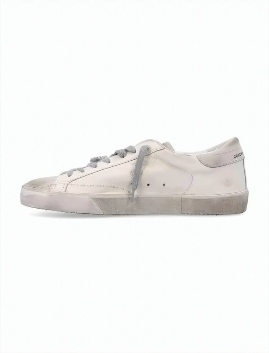 Golden Goose Distressed White Leather Low-Top Sneakers With Vintage Aesthetic